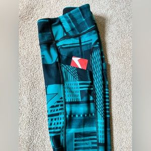 Lucy XS Capri Leggings/Tights with 2 Stash Pockets at Hips.